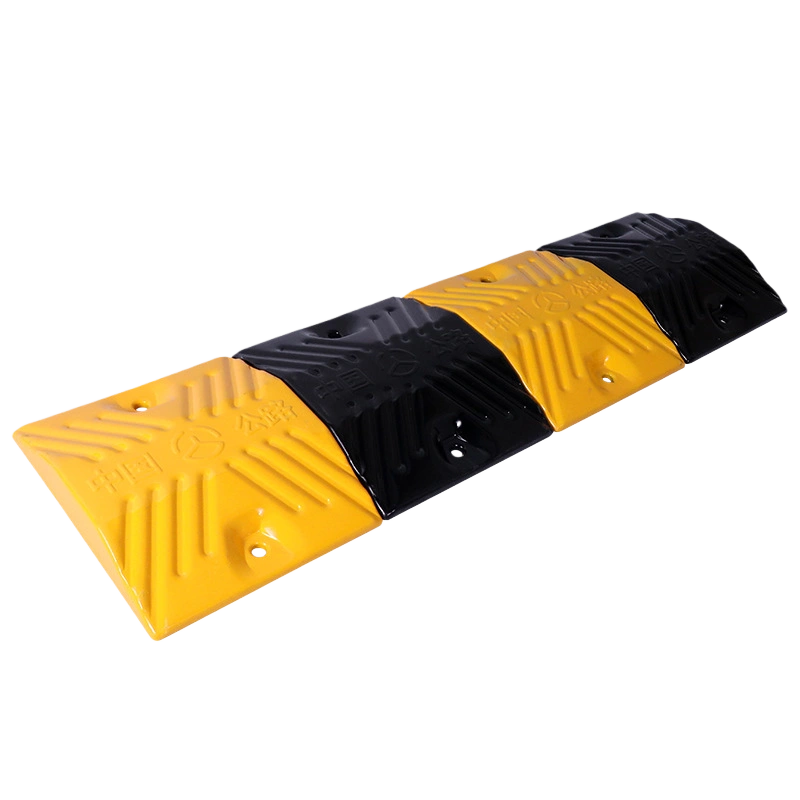 Yellow and black speed bump for traffic calming systems